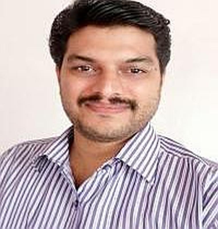 Dr SURESH T P